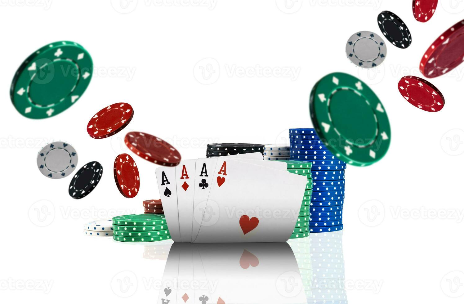 Close-up photo of four aces, colorful chips in piles standing behind and some of them are flying apart, isolated on white background.