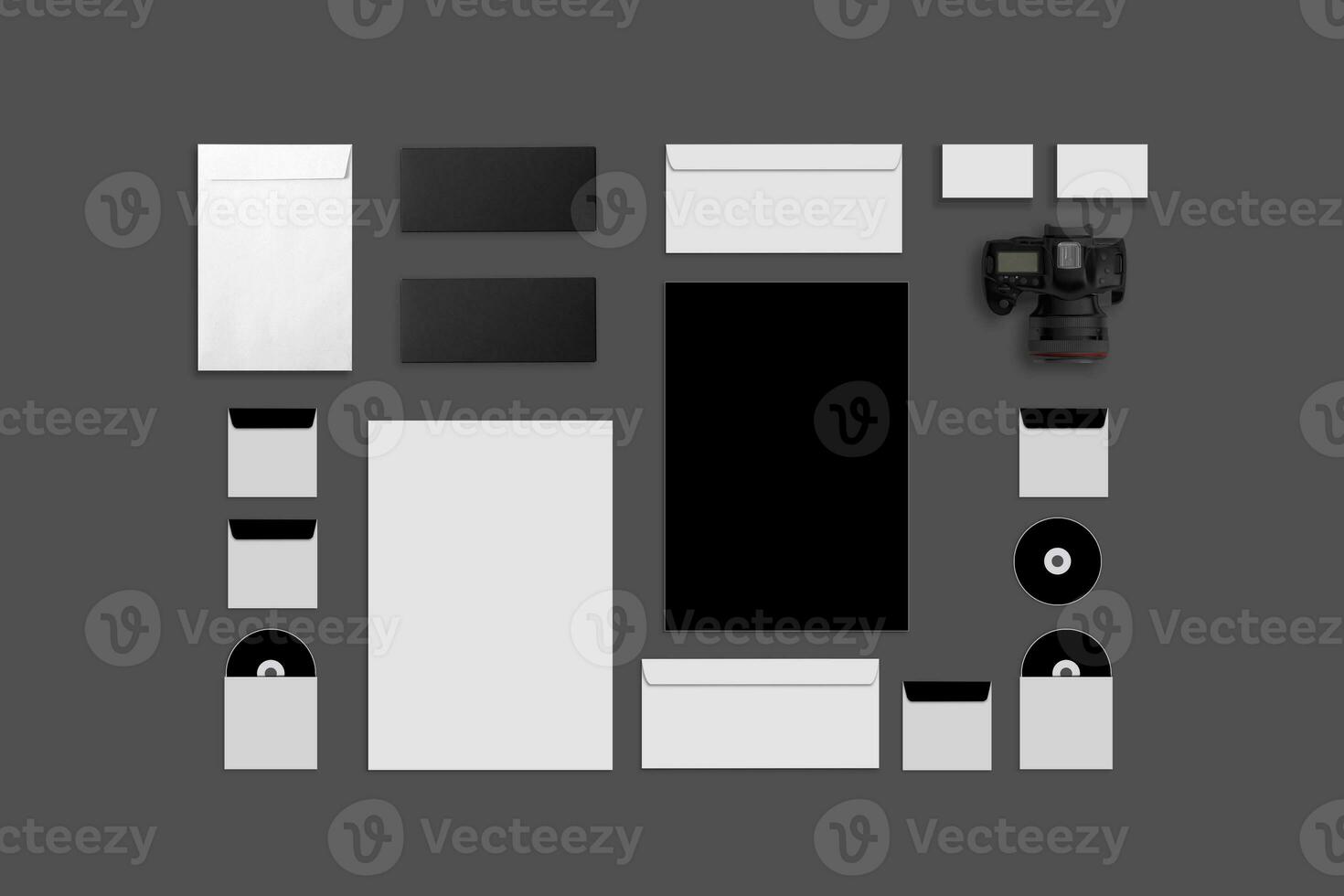 Blank Corporate ID. Set on gray background. Consist of business cards, folder, tablet PC, envelopes, a4 letterheads, notebooks, flash, pencil, cd disk and smart phones. photo