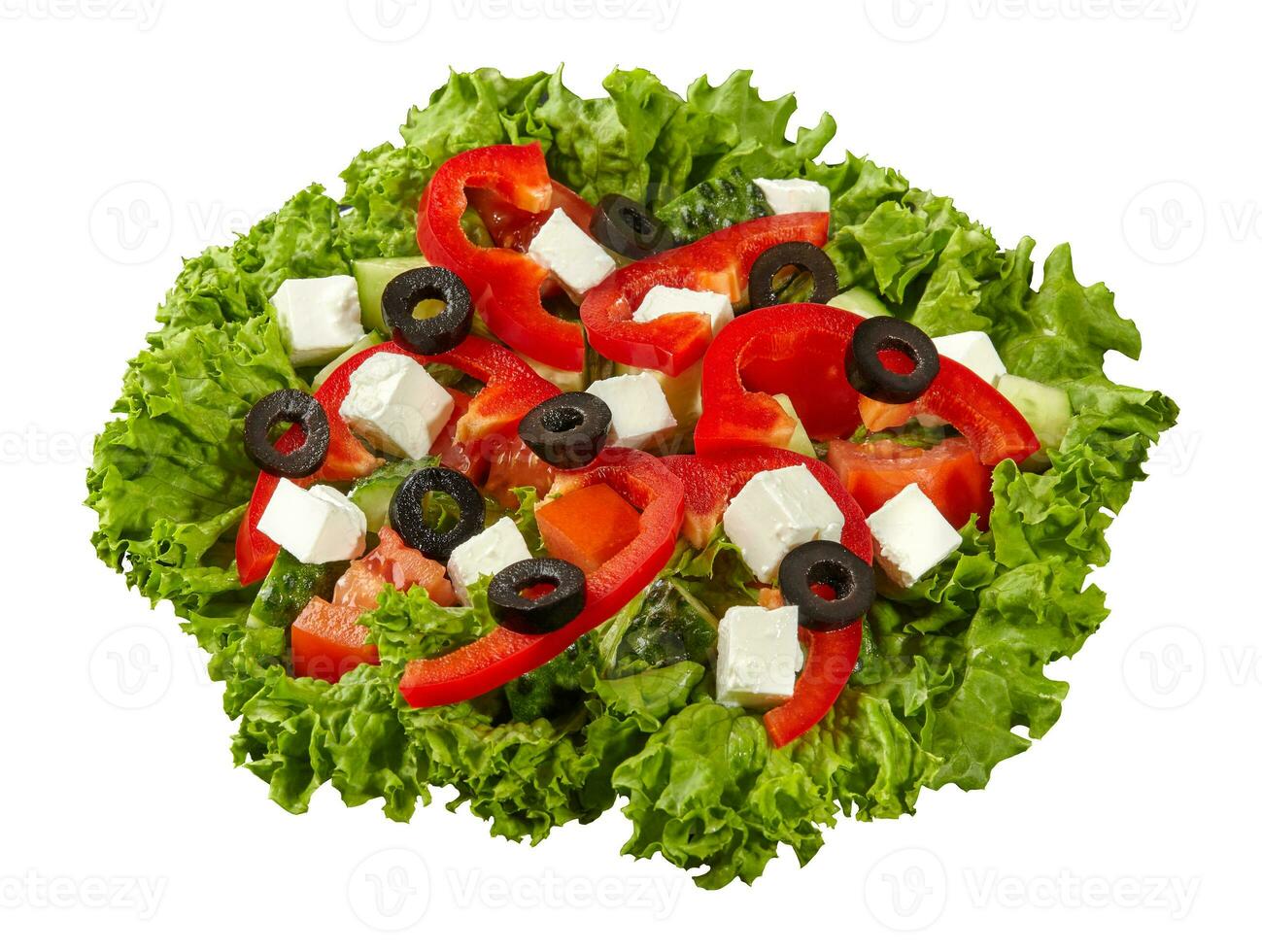 Greek salad with greens, sliced vegetables, olives and feta cheese isolated on white photo