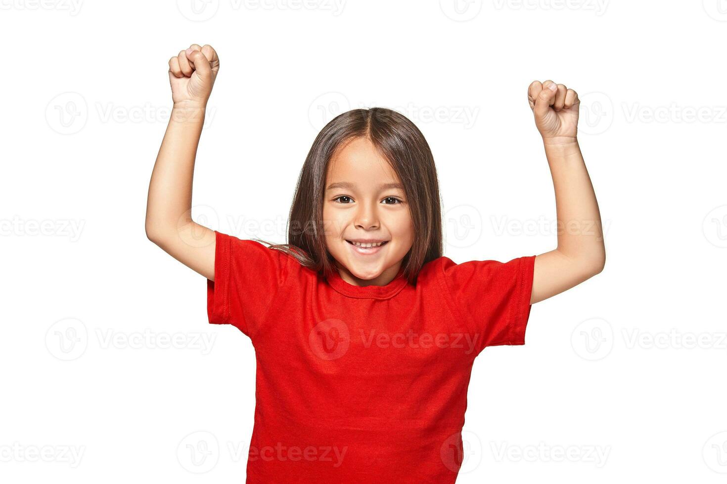 Studio portrait of a happy little girl photo