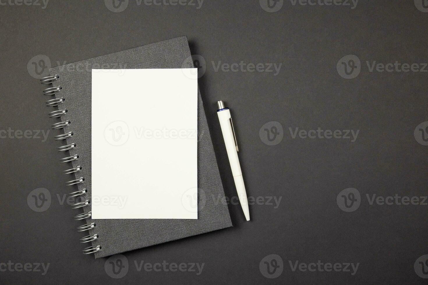 Greeting card mockup on dark background. Valentines, mothers, womens day, anniversary and birthday greeting flat lay. Top view. Copy space. photo