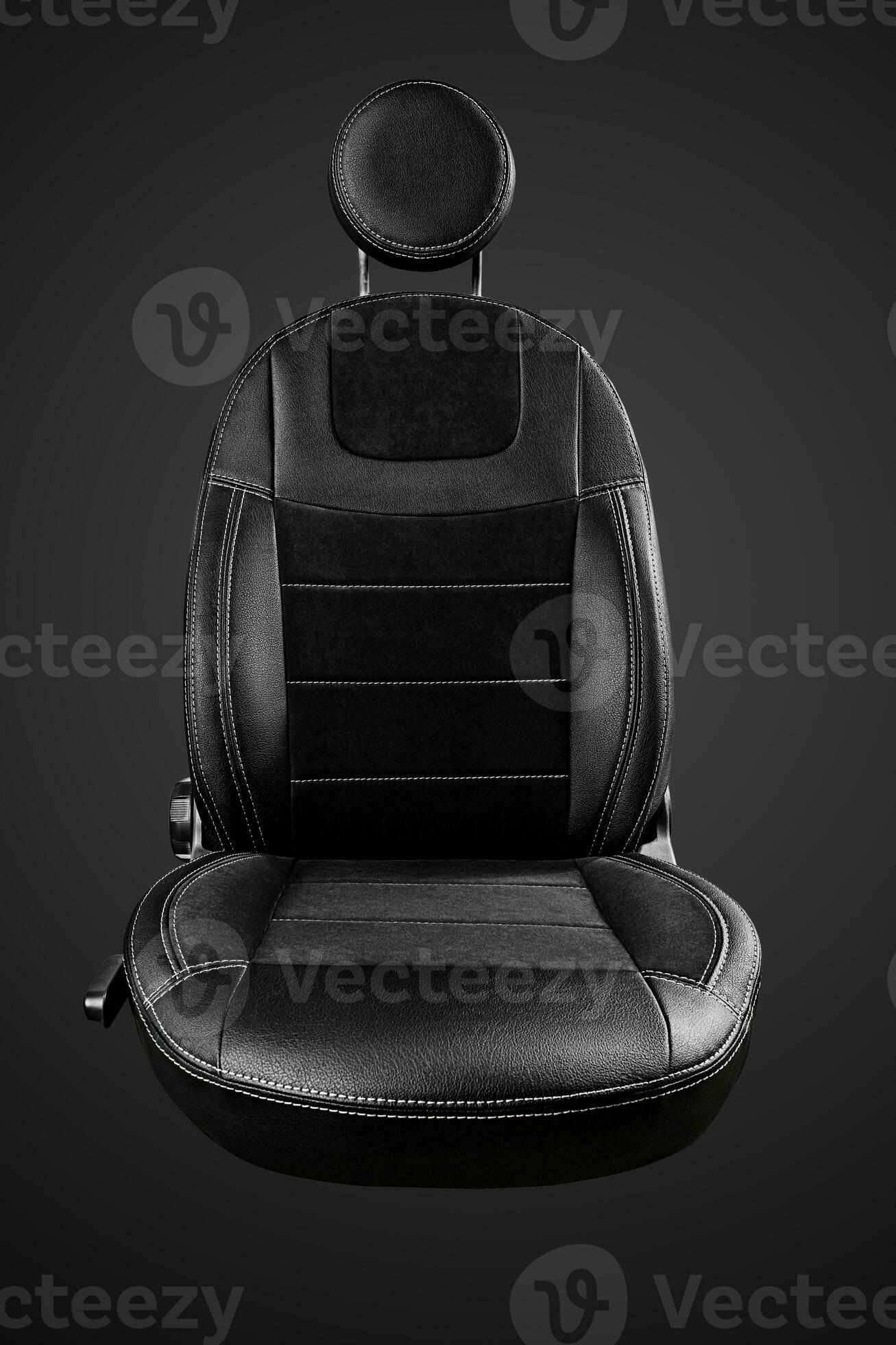 Comfortable driver car seat with round headrest isolated on black