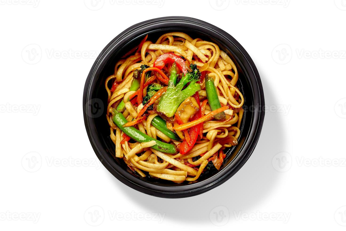 Stir fried udon wheat noodles with broccoli, bell pepper, green beans and mushrooms photo