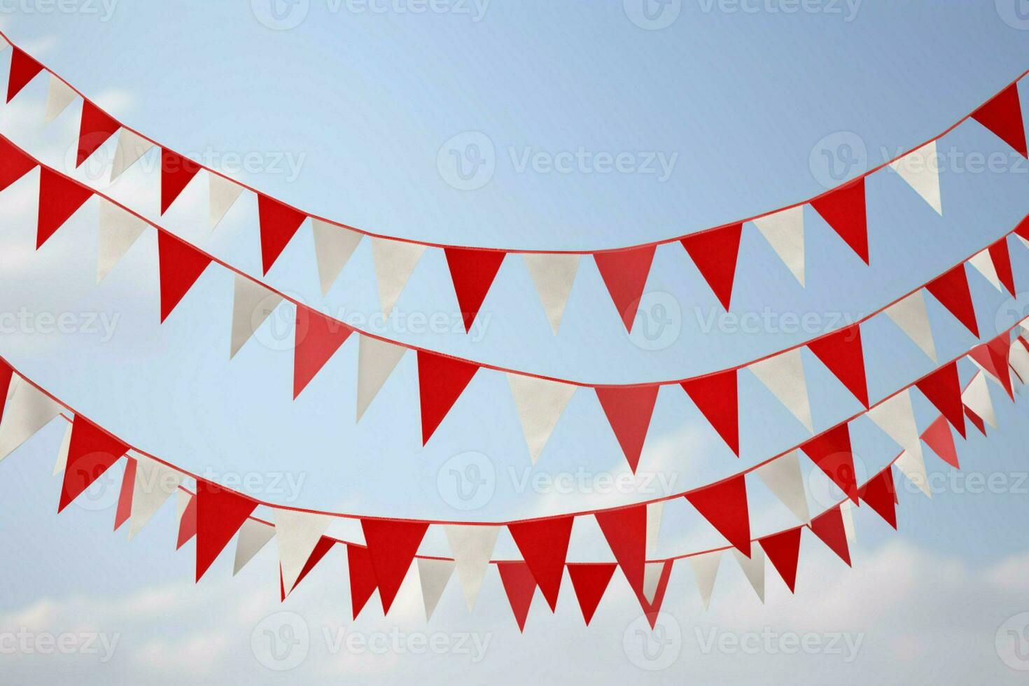 ai generado vibrante rojo y blanco verderón festivamente colgando con triangular banderas para celebraciones ai generado foto