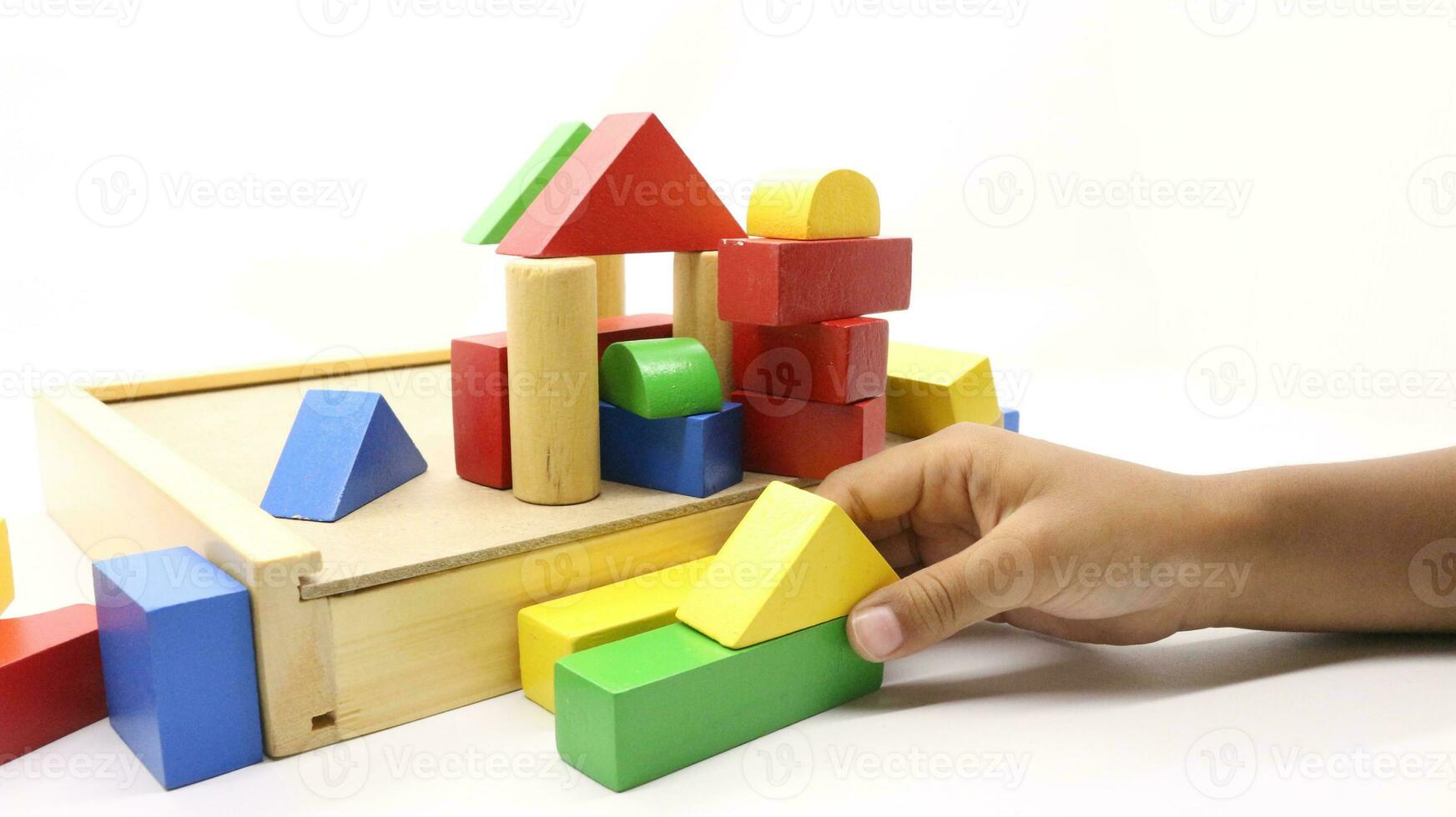 Colorful wooden puzzle toys being assembled photo