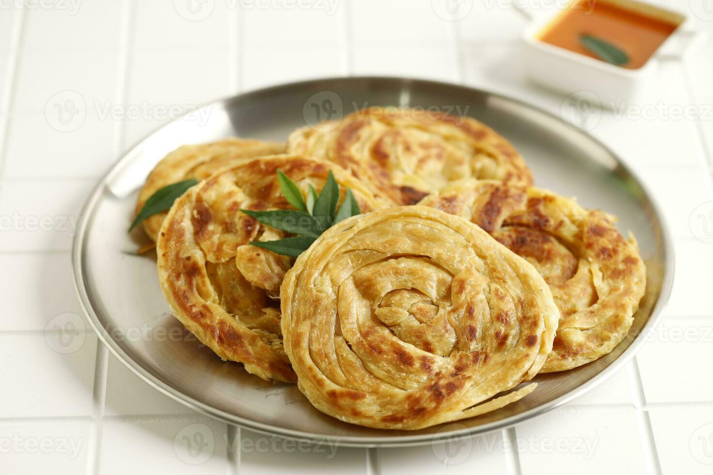 Roti Canai or Paratha Flat Bread photo