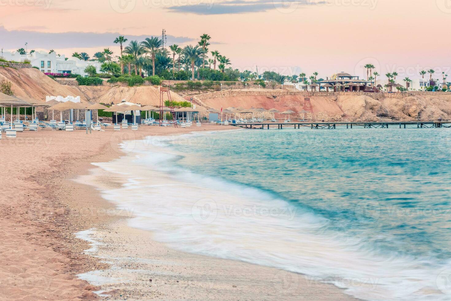 Beautiful beach coast in the Red Sea at sunset, Egypt. photo