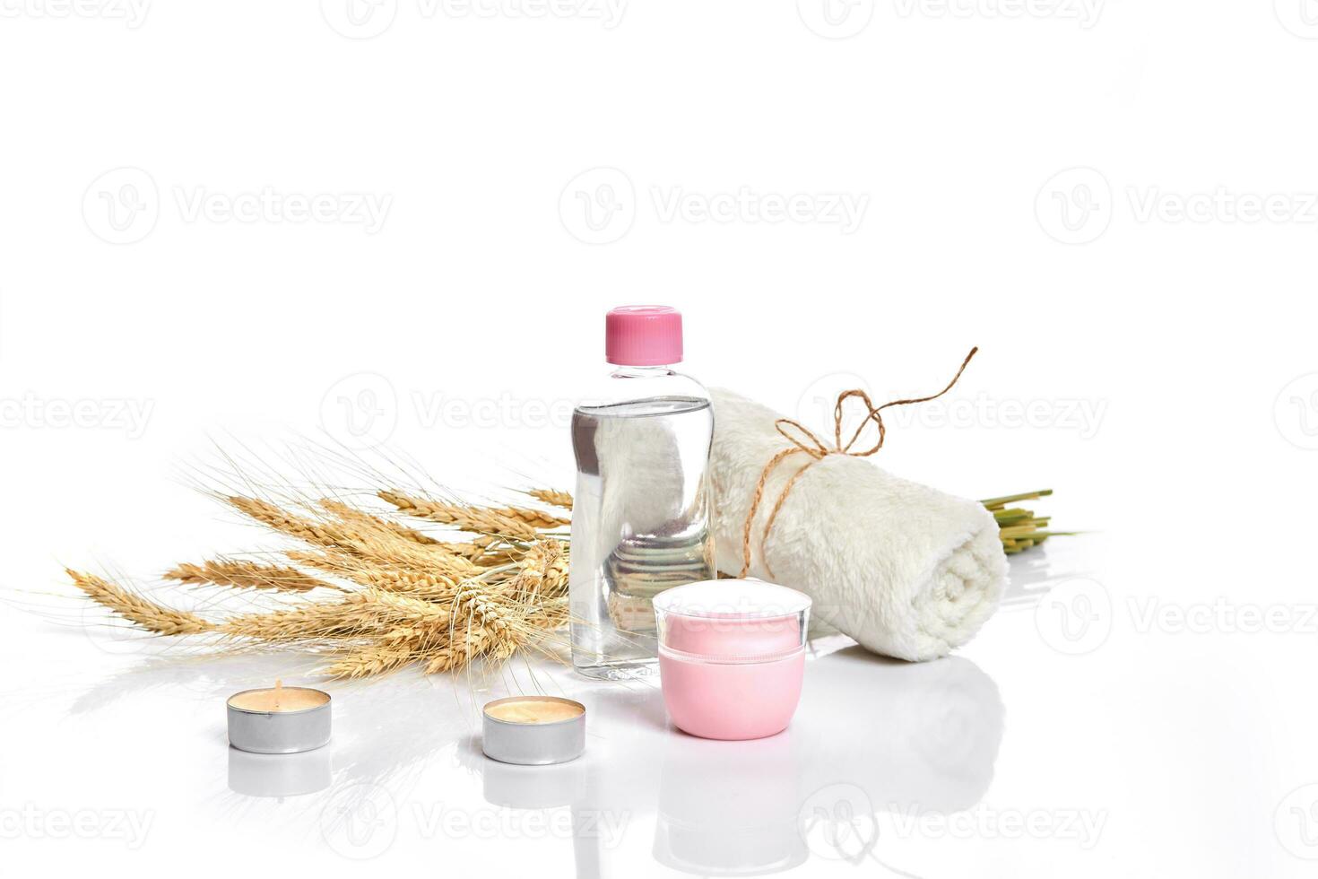 Herbal and mineral skincare. Jar of cream, oil with wheat, cosmetic bottles. Without label photo