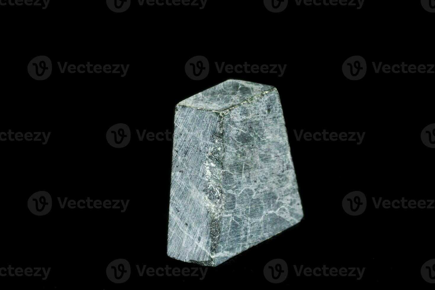 macro stone Serpentinite mineral on black background photo