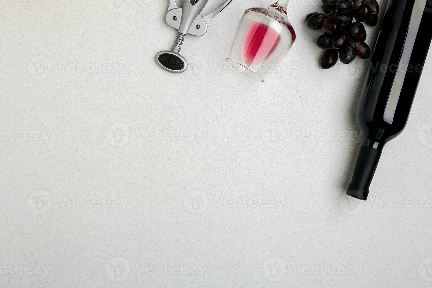 Bottle of red wine with glasses on white background top view mock-up photo