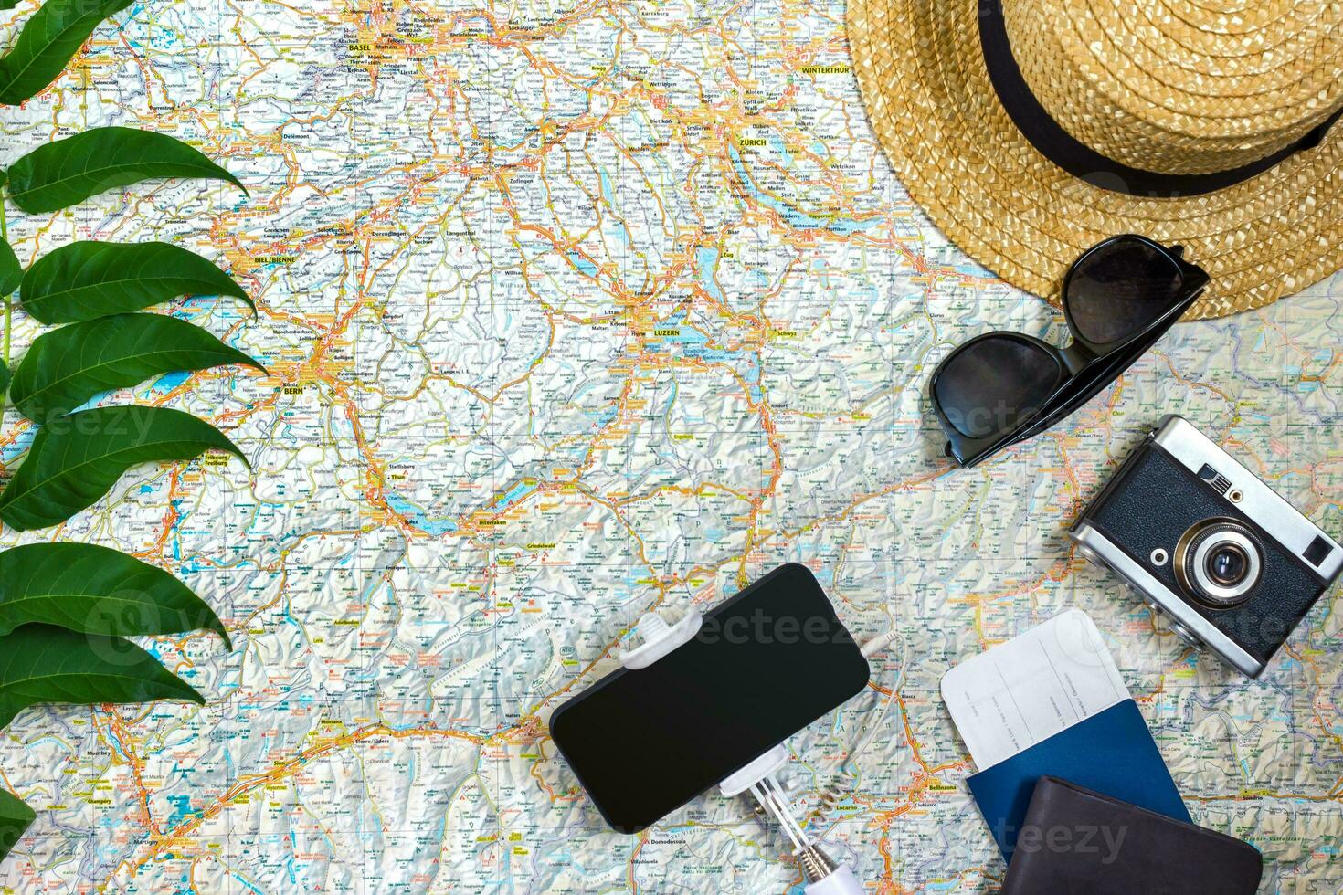 Travel plan, trip vacation accessories for trip, tourism mockup - Outfit of traveler on map background. Flat lay and copyspace. photo