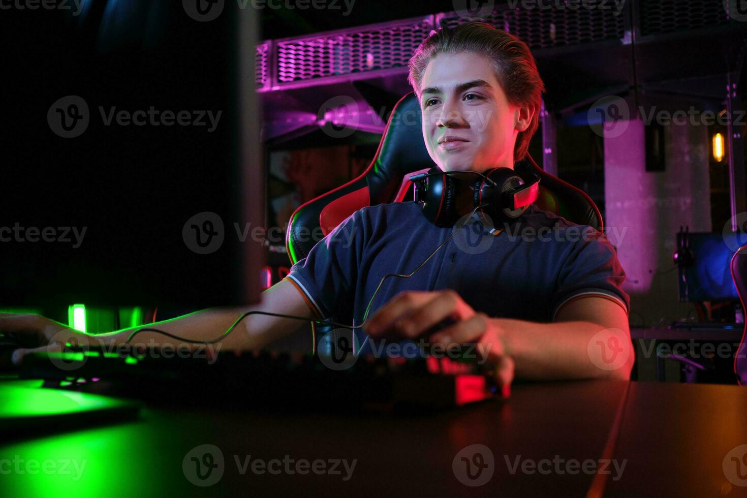 Cyber sport. Team play. Professional cybersport player training or playing online game on his PC photo