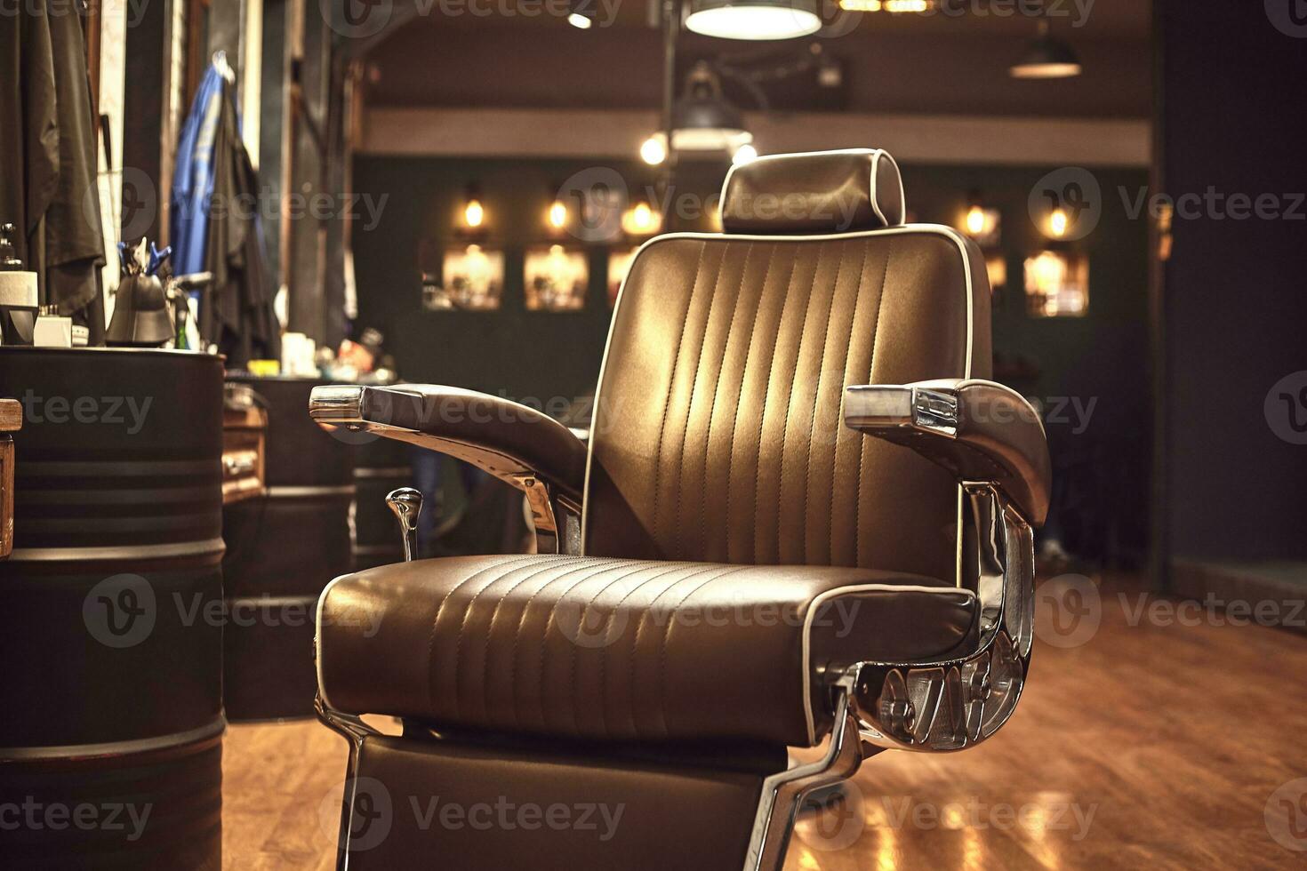 Brown leather chair in barbershop. Loft style photo