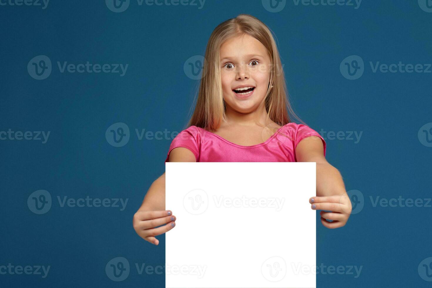 Portrait of adorable emotional little girl on blue background photo