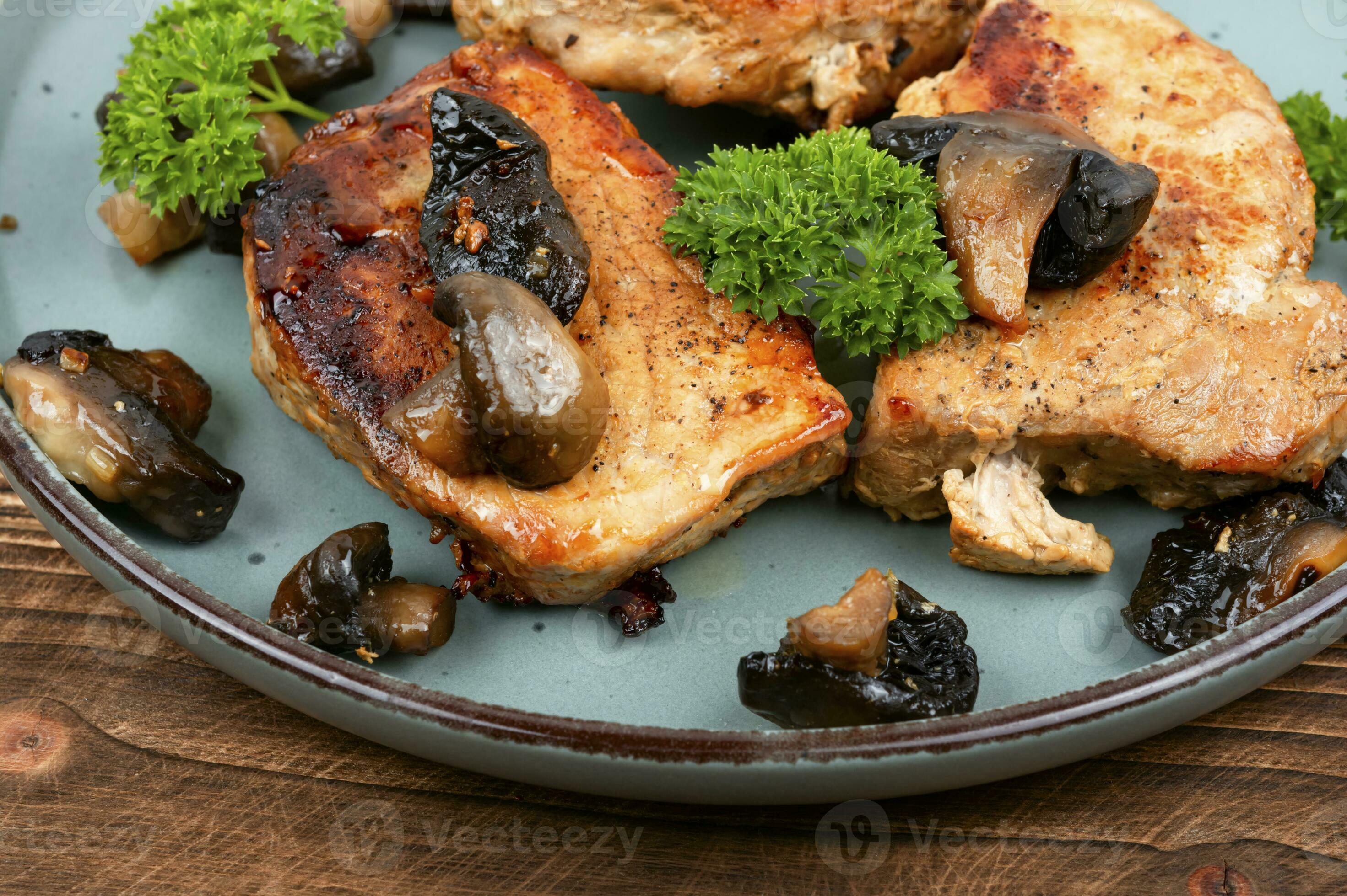 Medallion of pork fillet with mushrooms. 34941176 Stock Photo at Vecteezy