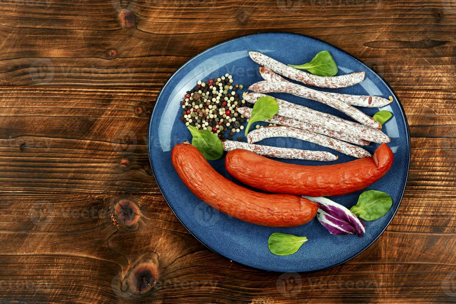 Kabanos sausages on wooden background. photo