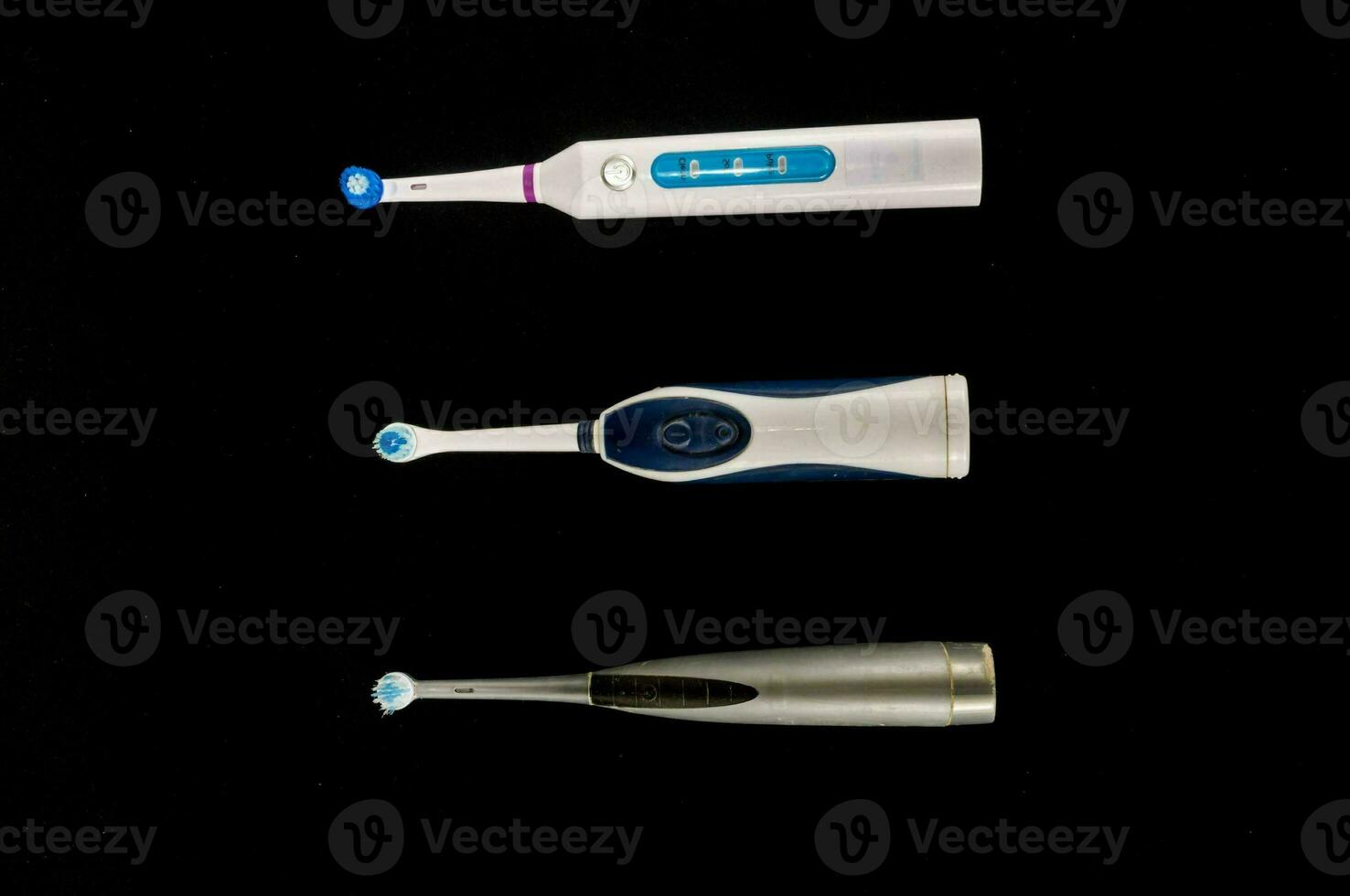 three different types of electric toothbrushes are shown photo
