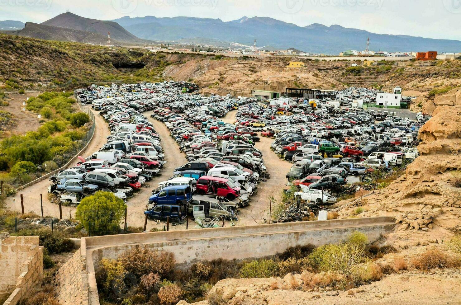 a large parking lot full of cars photo