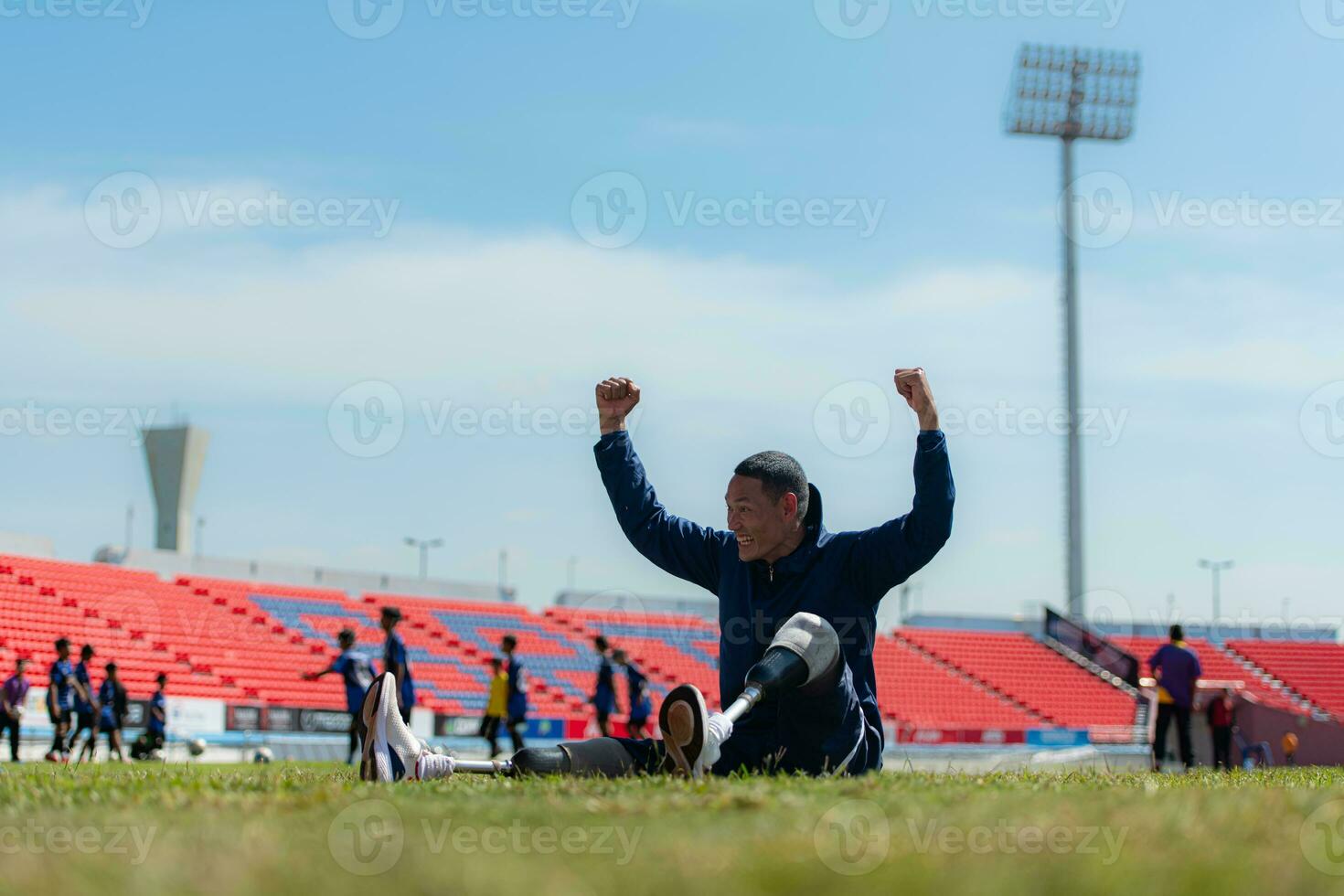 Athletes with disabilities take a break at the stadium between training sessions. photo