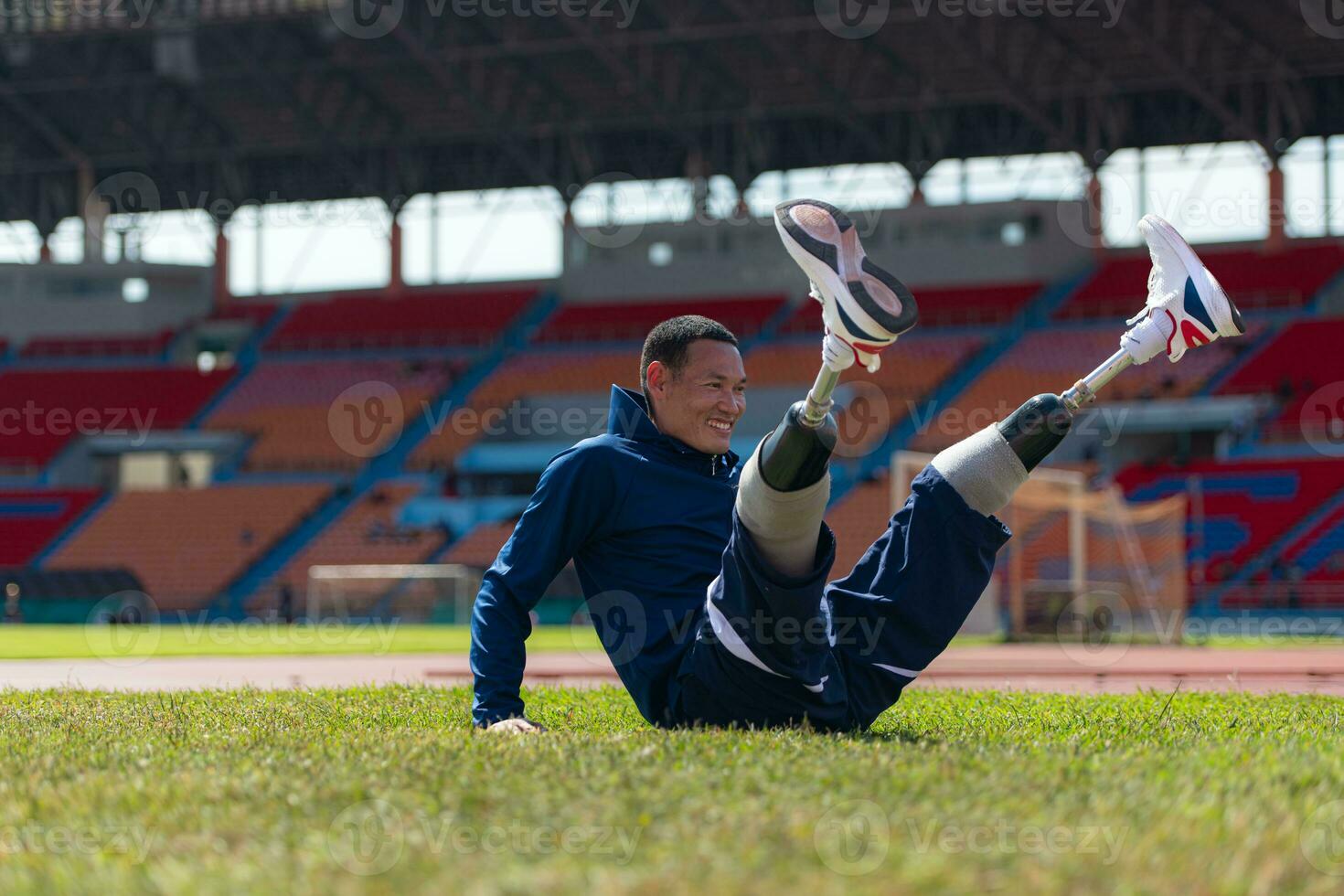 Athletes with disabilities take a break at the stadium between training sessions. photo