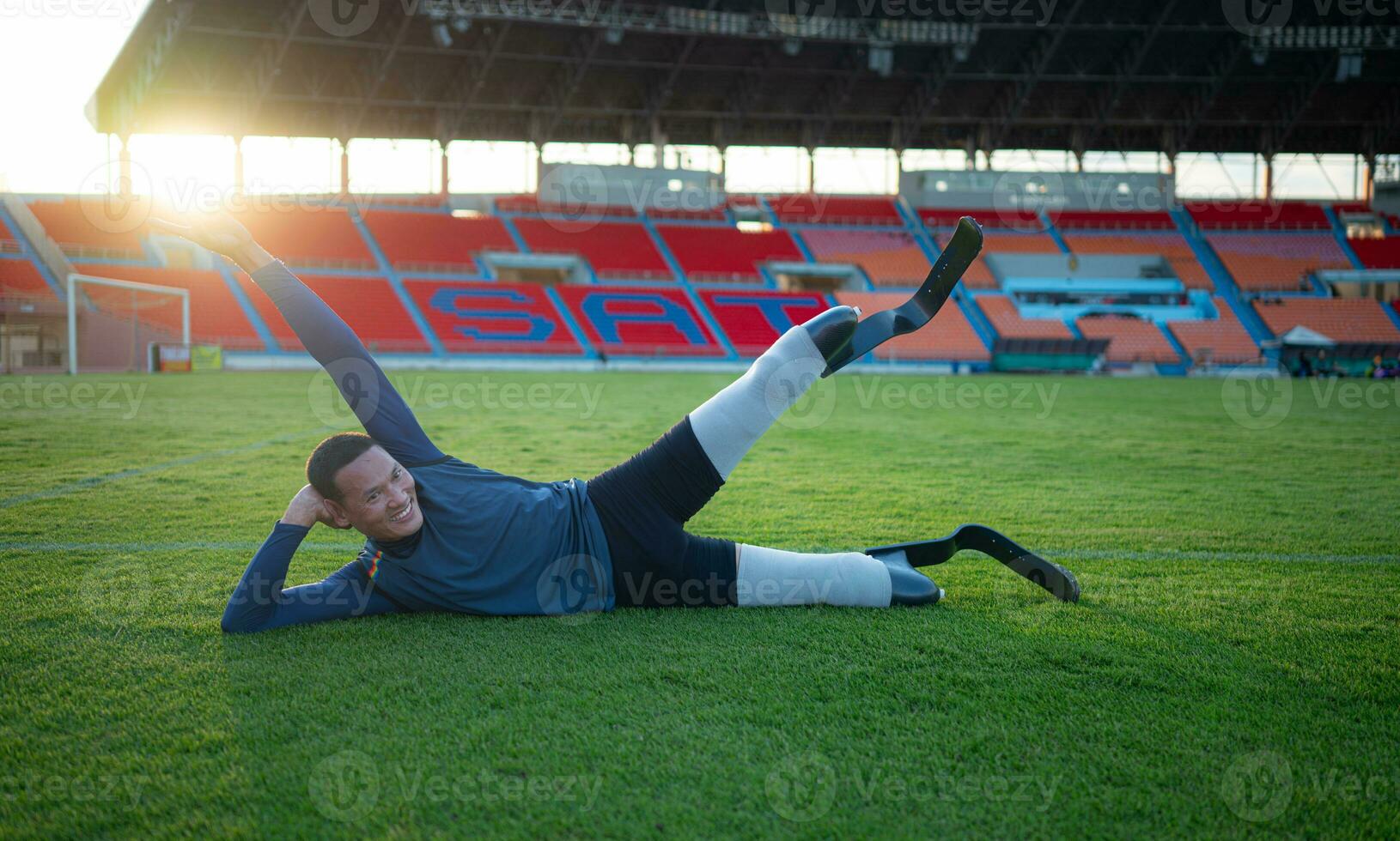 Athletes with disabilities take a break at the stadium between training sessions. photo