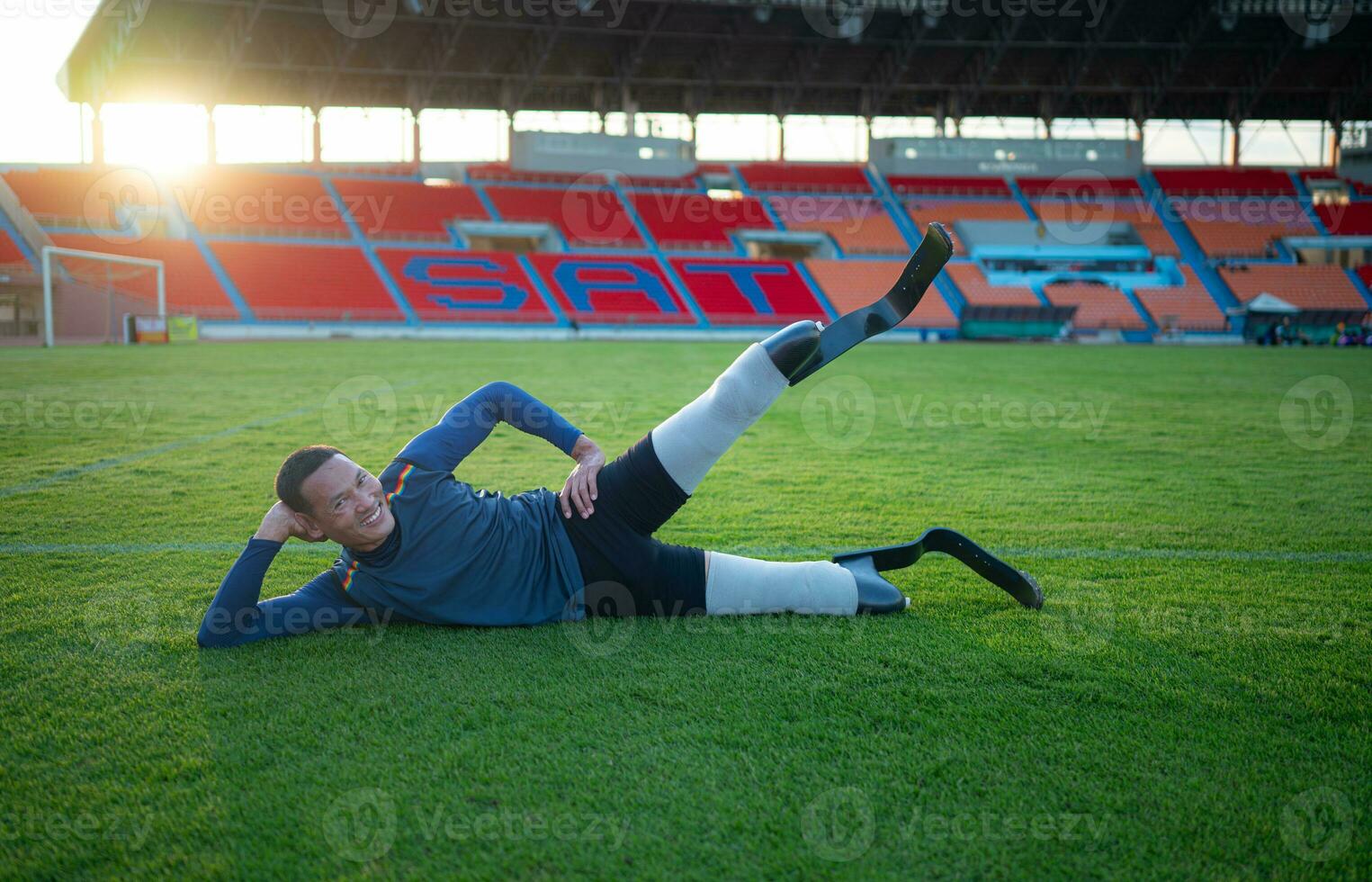 Athletes with disabilities take a break at the stadium between training sessions. photo