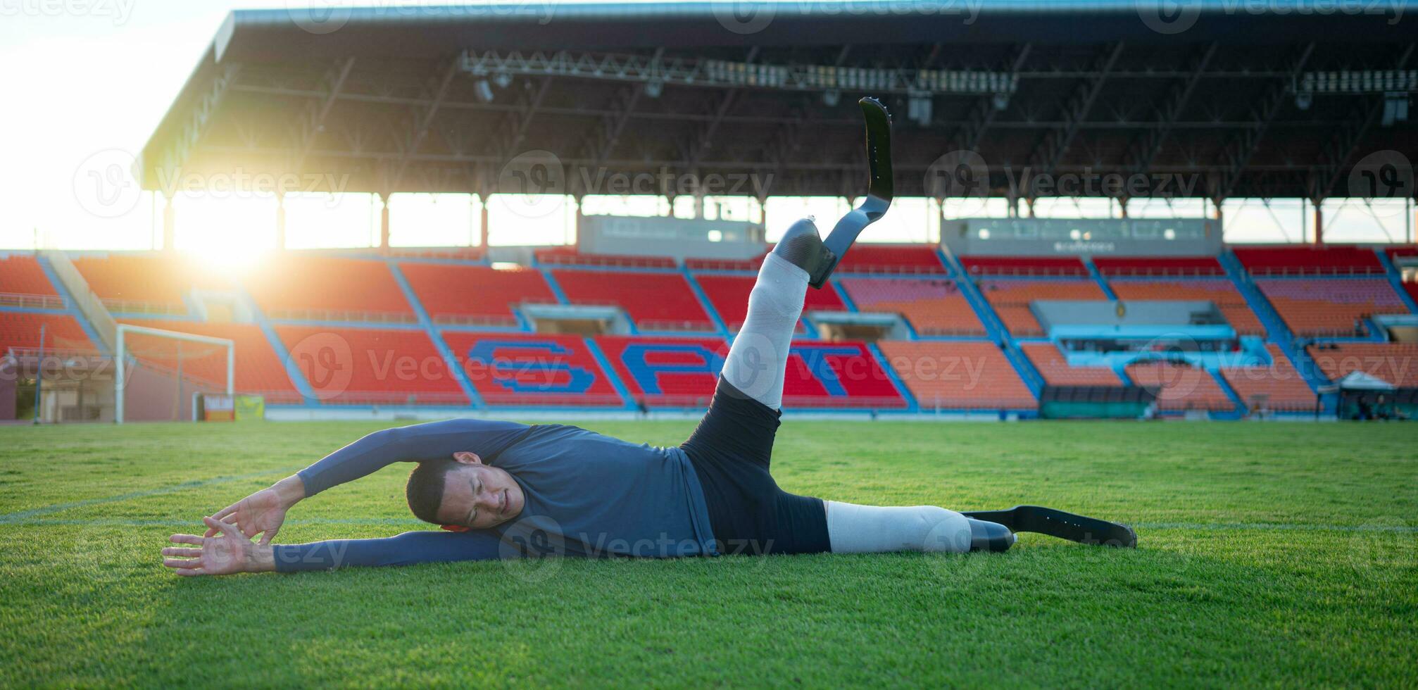 Athletes with disabilities take a break at the stadium between training sessions. photo
