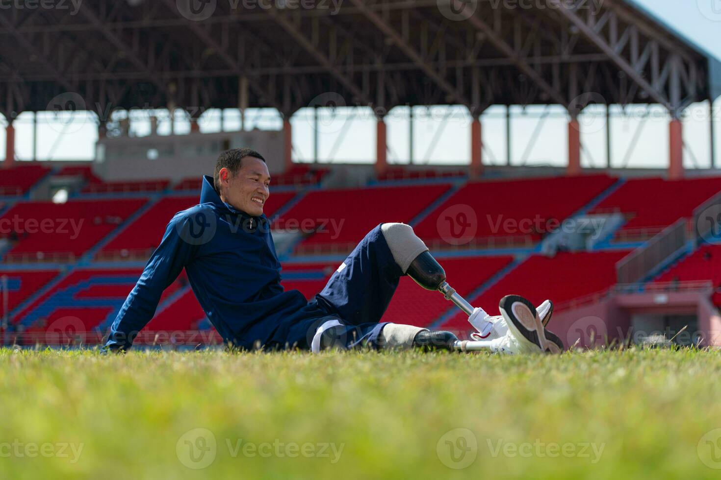 Athletes with disabilities take a break at the stadium between training sessions. photo