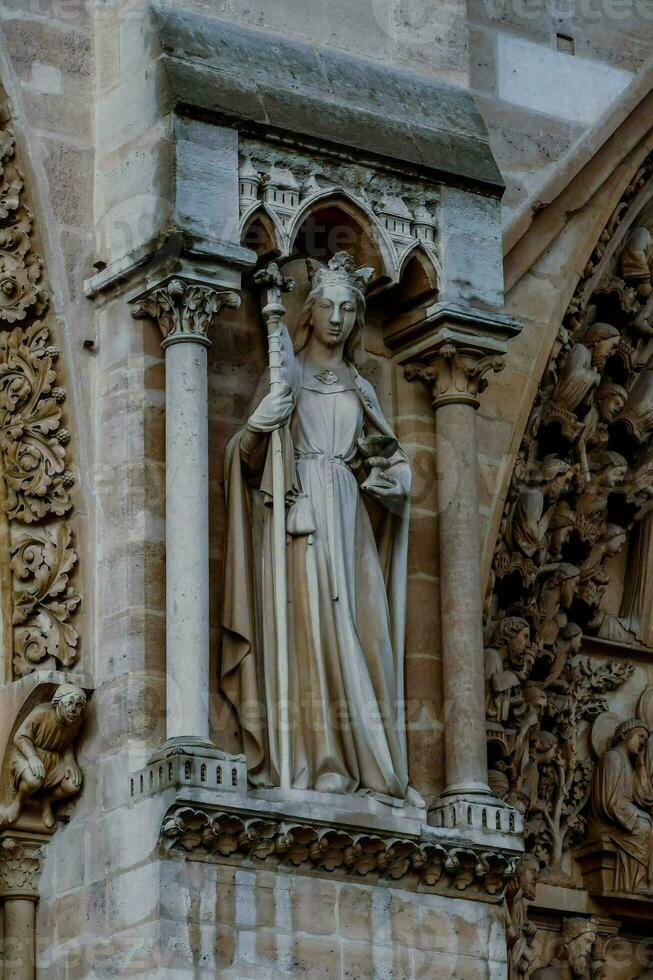 statue of saint jude in the cathedral of barcelona photo