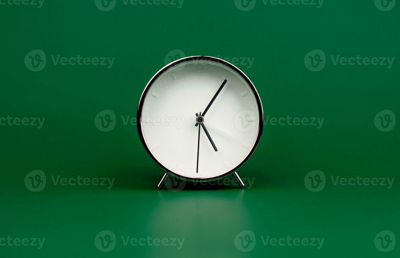 Alarm clock, standing still time, rules of time and how time works, studio photography photo