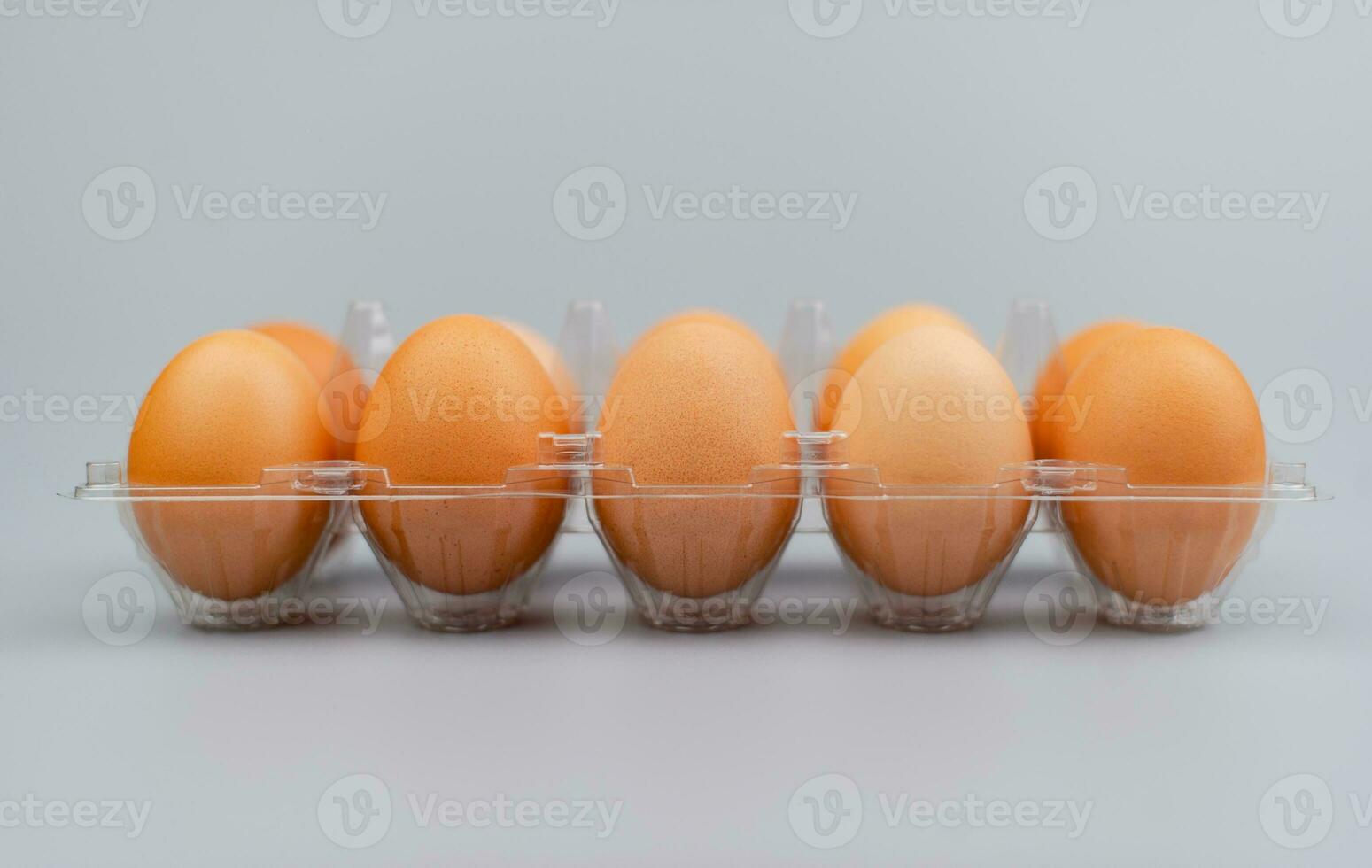 Chicken eggs arranged in egg casings. Brown eggs. Fresh breakfast eggs that are high in protein. animal egg shell photo