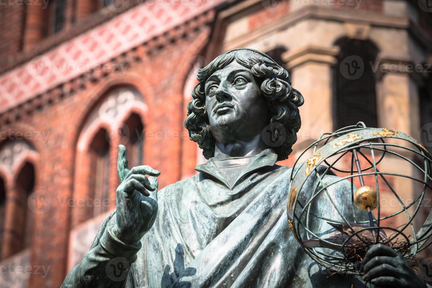 Monument of great astronomer Nicolaus Copernicus, Torun, Poland photo