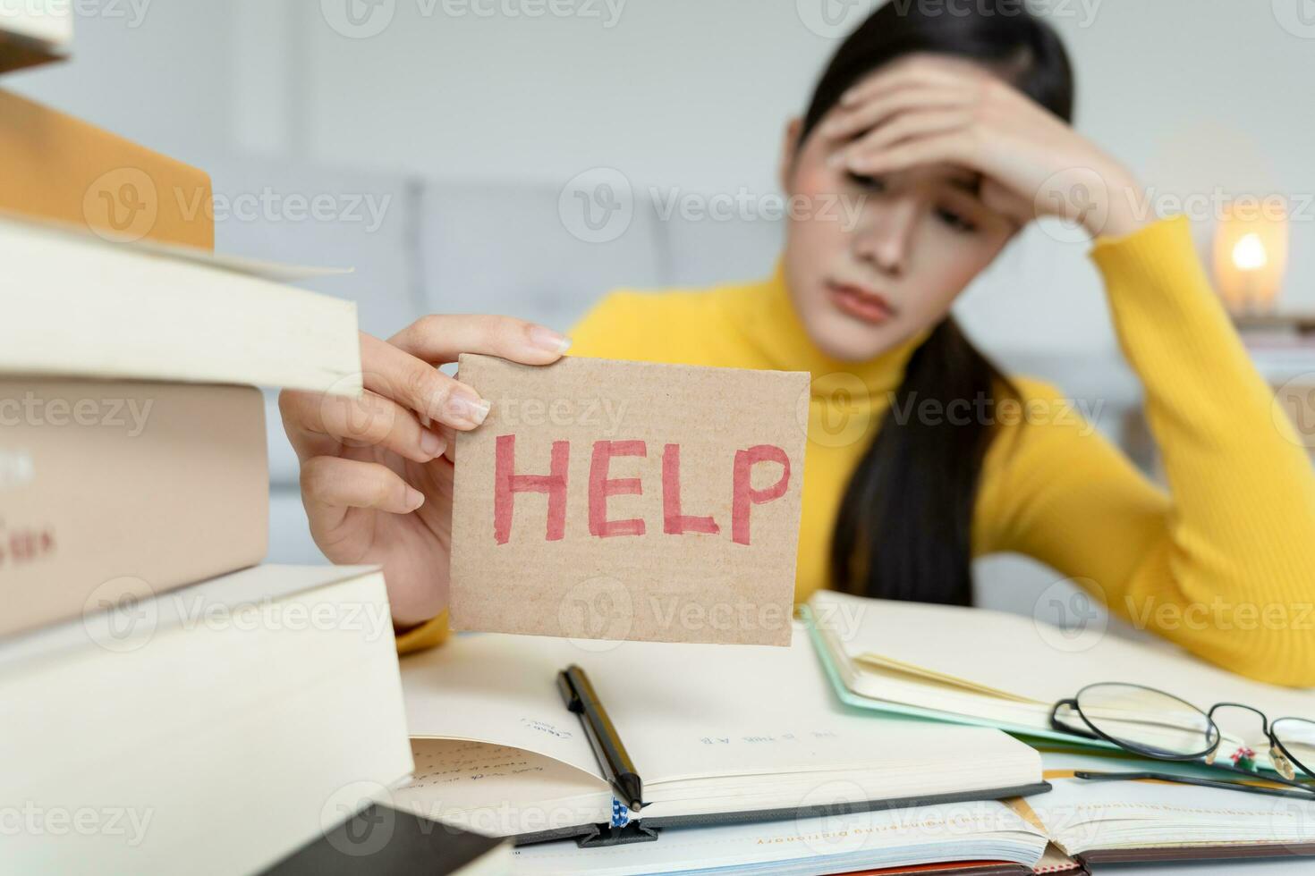 Asian student woman have anxiety because of exams, female prepare for test and learning lessons in the library. stress, despair, haste, misunderstanding reading, discouraged, expectation, knowledge photo