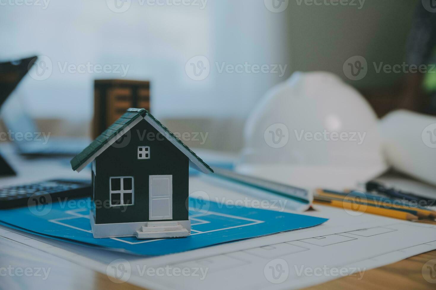 Construction and structure concept of Engineer or architect meeting for project working with partner and engineering tools on model building and blueprint in working site, contract for both companies. photo
