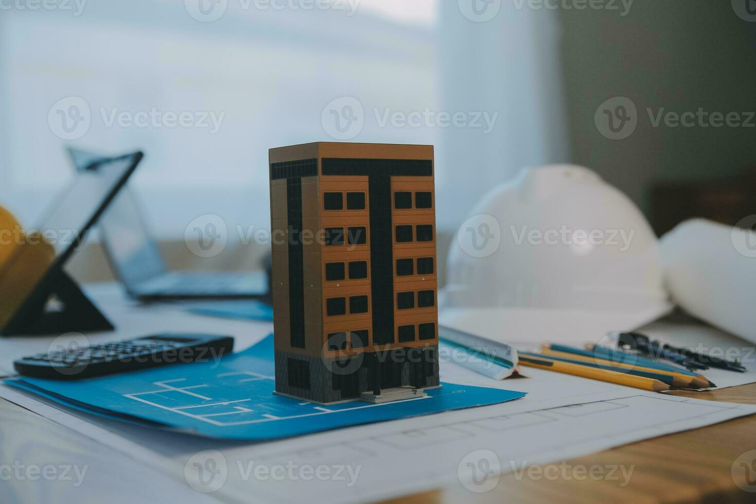 Construction and structure concept of Engineer or architect meeting for project working with partner and engineering tools on model building and blueprint in working site, contract for both companies. photo