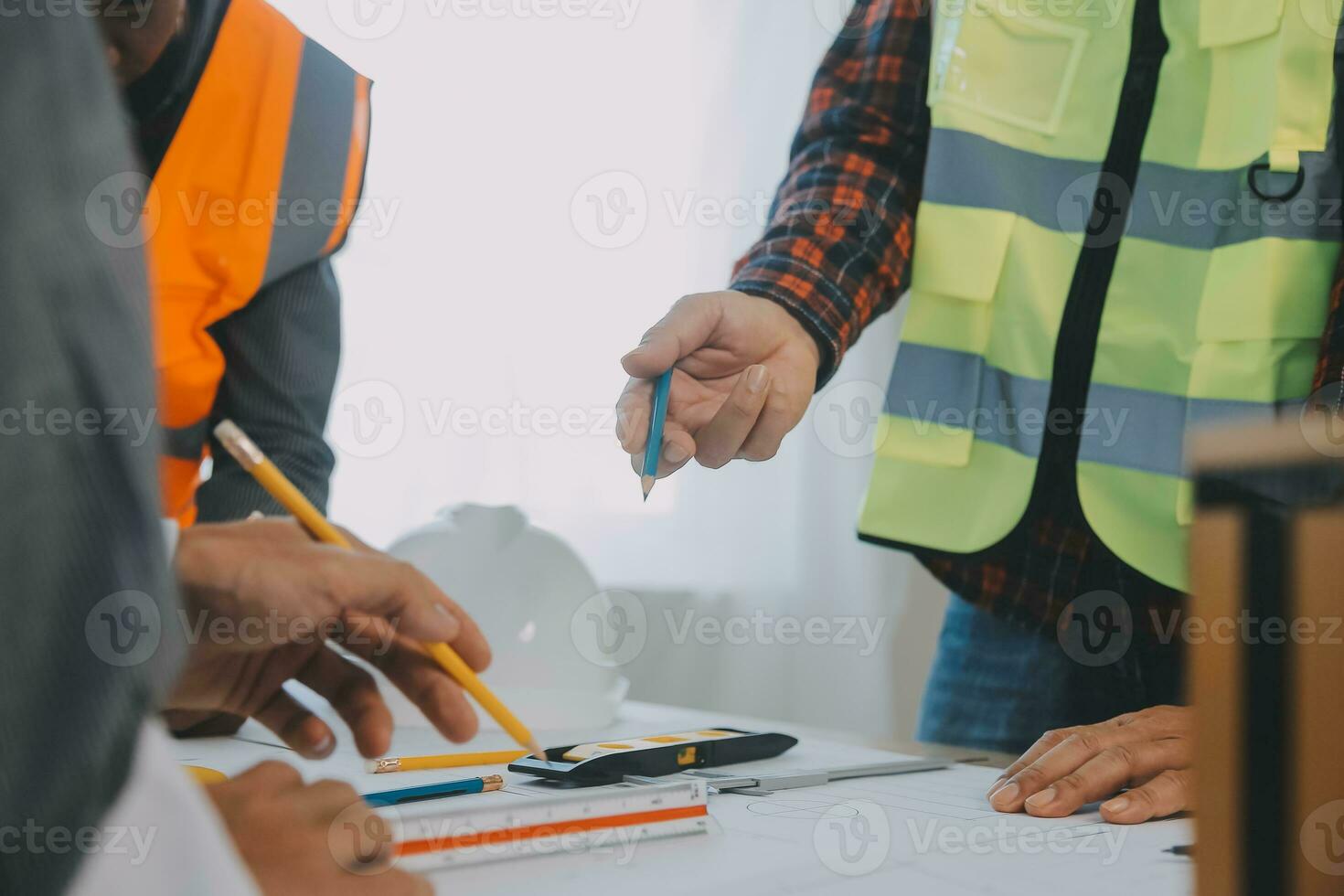 Construction and structure concept of Engineer or architect meeting for project working with partner and engineering tools on model building and blueprint in working site, contract for both companies. photo