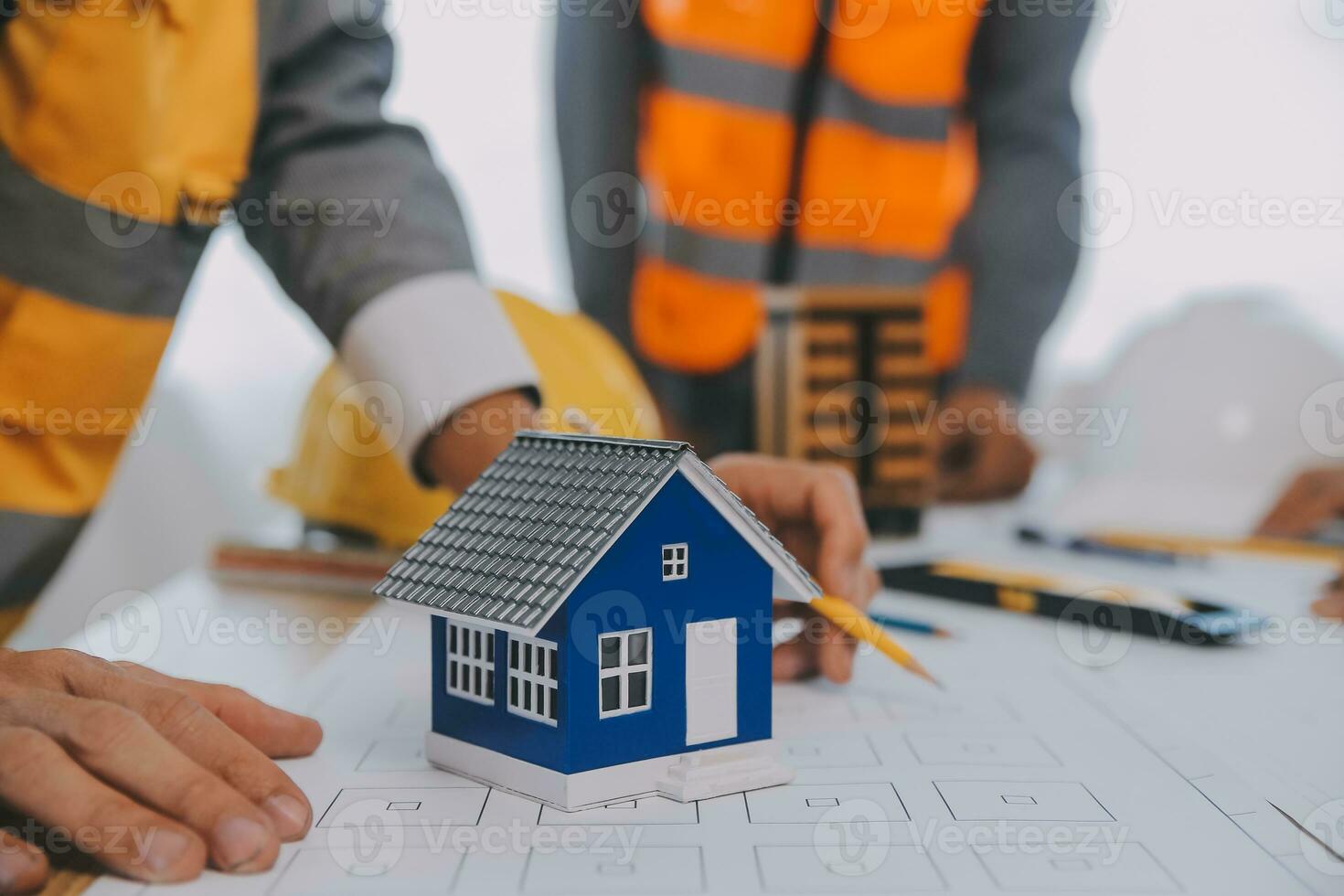 Construction and structure concept of Engineer or architect meeting for project working with partner and engineering tools on model building and blueprint in working site, contract for both companies. photo