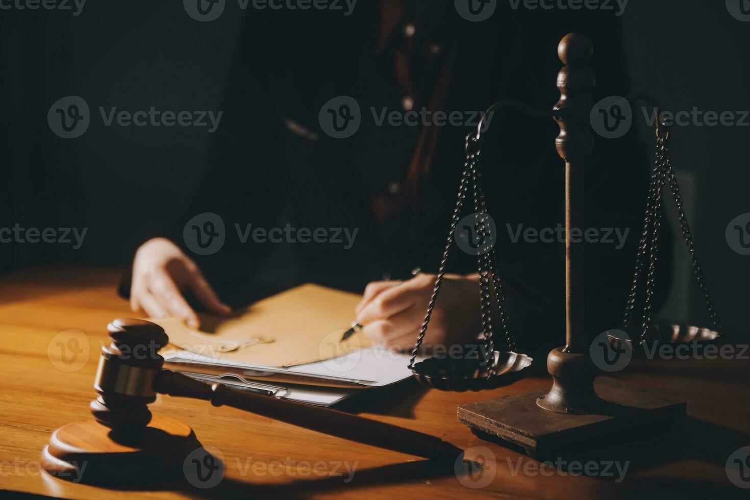 Business and lawyers discussing contract papers with brass scale on desk in office. Law, legal services, advice, justice and law concept picture with film grain effect photo