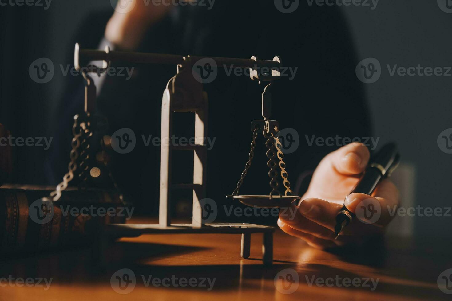 Business and lawyers discussing contract papers with brass scale on desk in office. Law, legal services, advice, justice and law concept picture with film grain effect photo