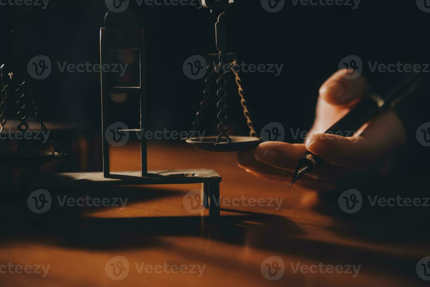 Business and lawyers discussing contract papers with brass scale on desk in office. Law, legal services, advice, justice and law concept picture with film grain effect photo