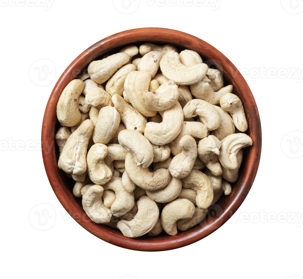 Roasted cashew nuts in a bowl isolated on a transparent background. Clipping path is included for easy selection png