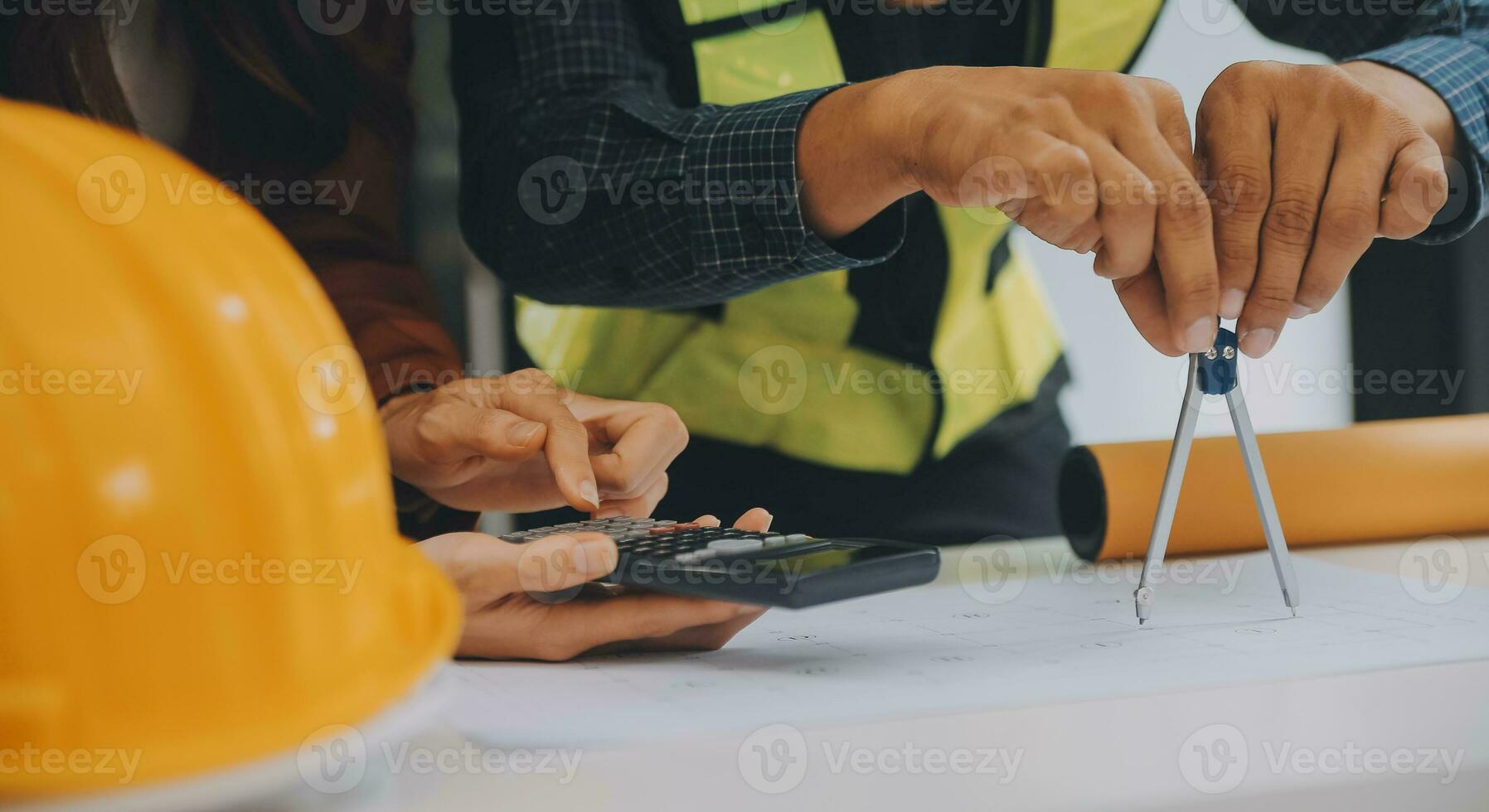 Engineer Teamwork Meeting, Drawing working on blueprint meeting for project working with partner on model building and engineering tools in working site, Construction and structure concept. photo