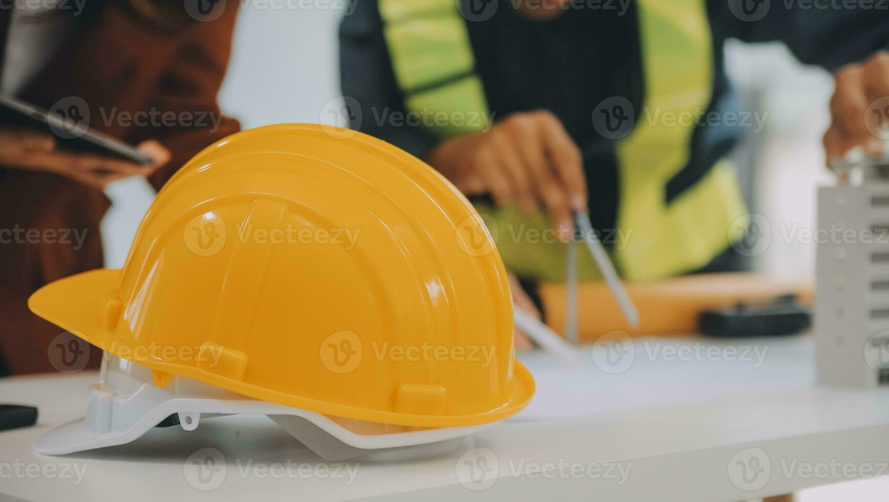 Engineer Teamwork Meeting, Drawing working on blueprint meeting for project working with partner on model building and engineering tools in working site, Construction and structure concept. photo