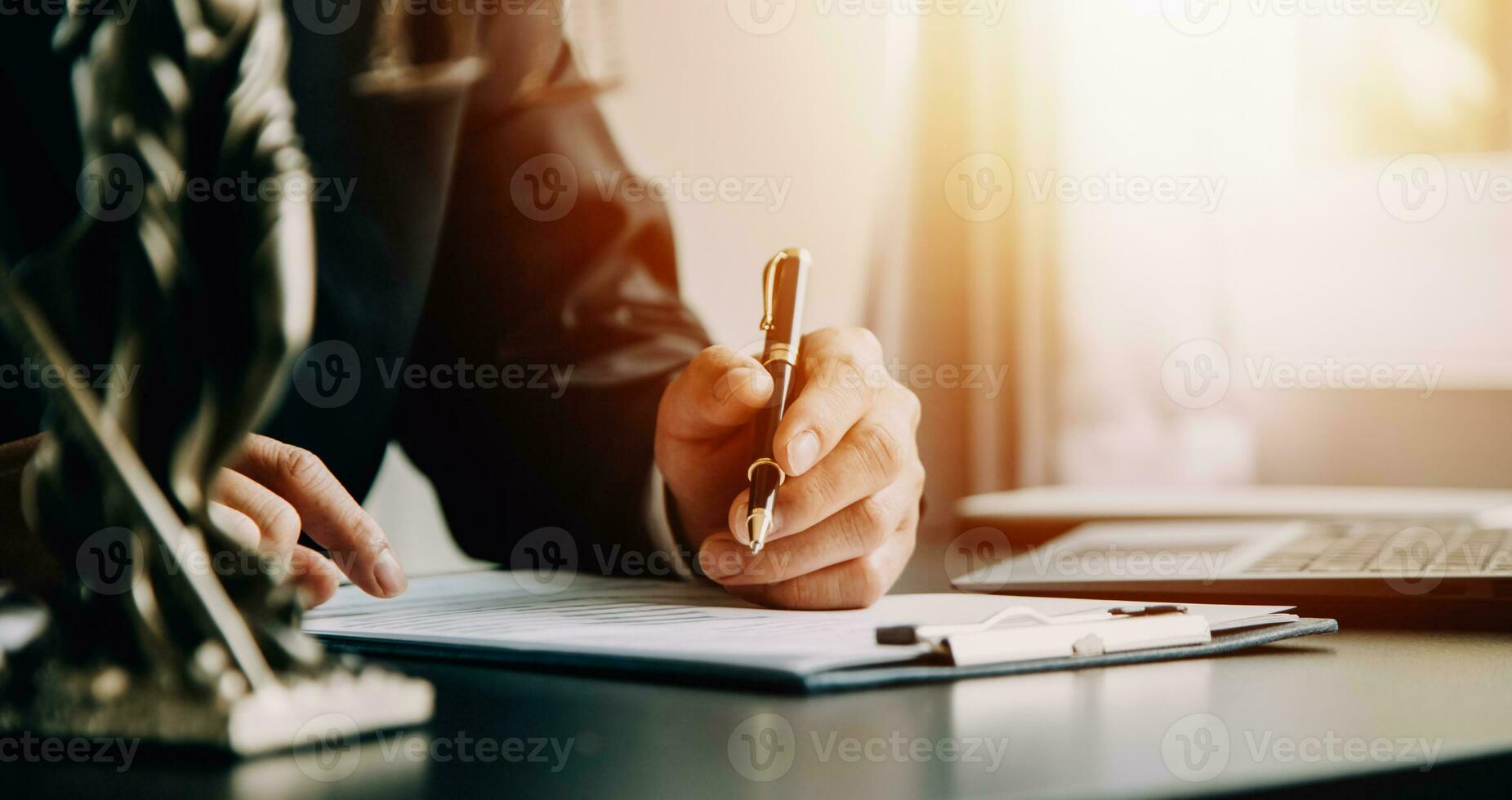 Business and lawyers discussing contract papers with brass scale on desk in office. Law, legal services, advice, justice and law concept picture with film grain effect photo