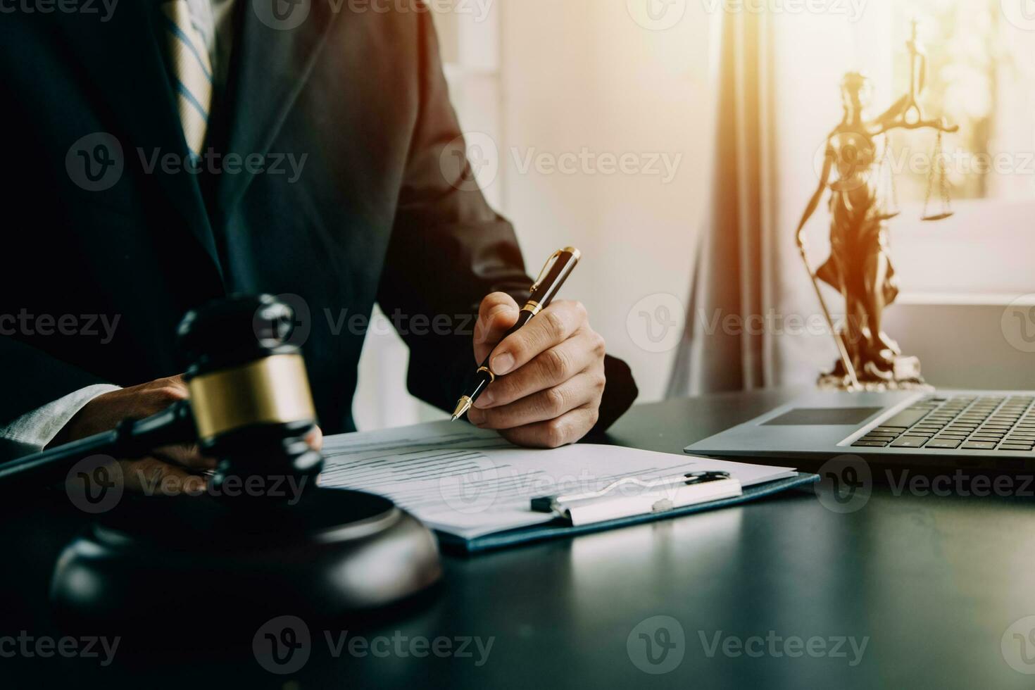 Business and lawyers discussing contract papers with brass scale on desk in office. Law, legal services, advice, justice and law concept picture with film grain effect photo