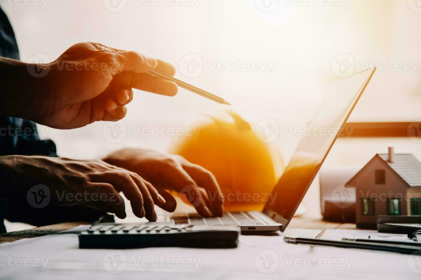 Construction and structure concept of Engineer or architect meeting for project working with partner and engineering tools on model building and blueprint in working site, contract for both companies. photo