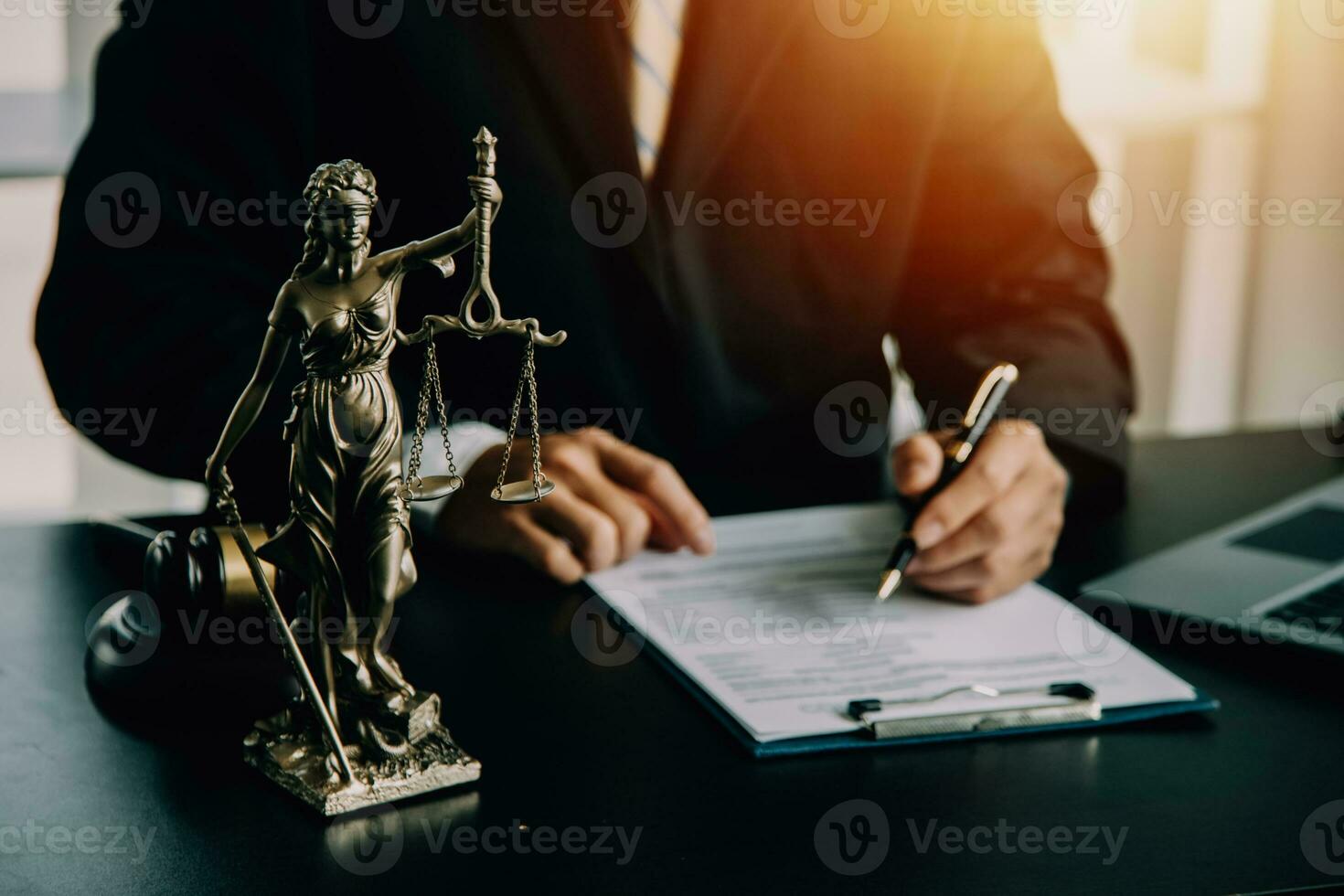 Business and lawyers discussing contract papers with brass scale on desk in office. Law, legal services, advice, justice and law concept picture with film grain effect photo