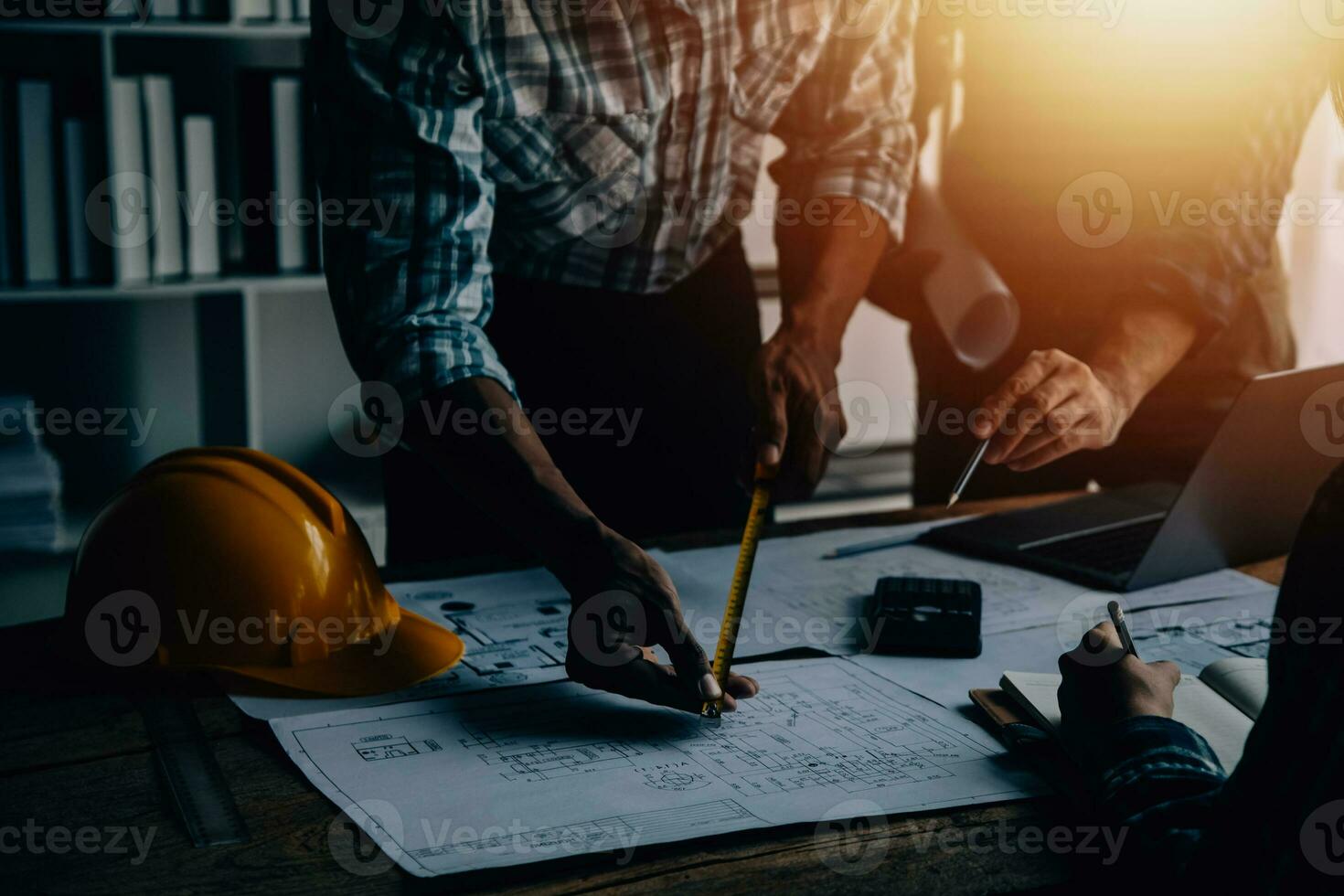 Construction and structure concept of Engineer or architect meeting for project working with partner and engineering tools on model building and blueprint in working site, contract for both companies. photo
