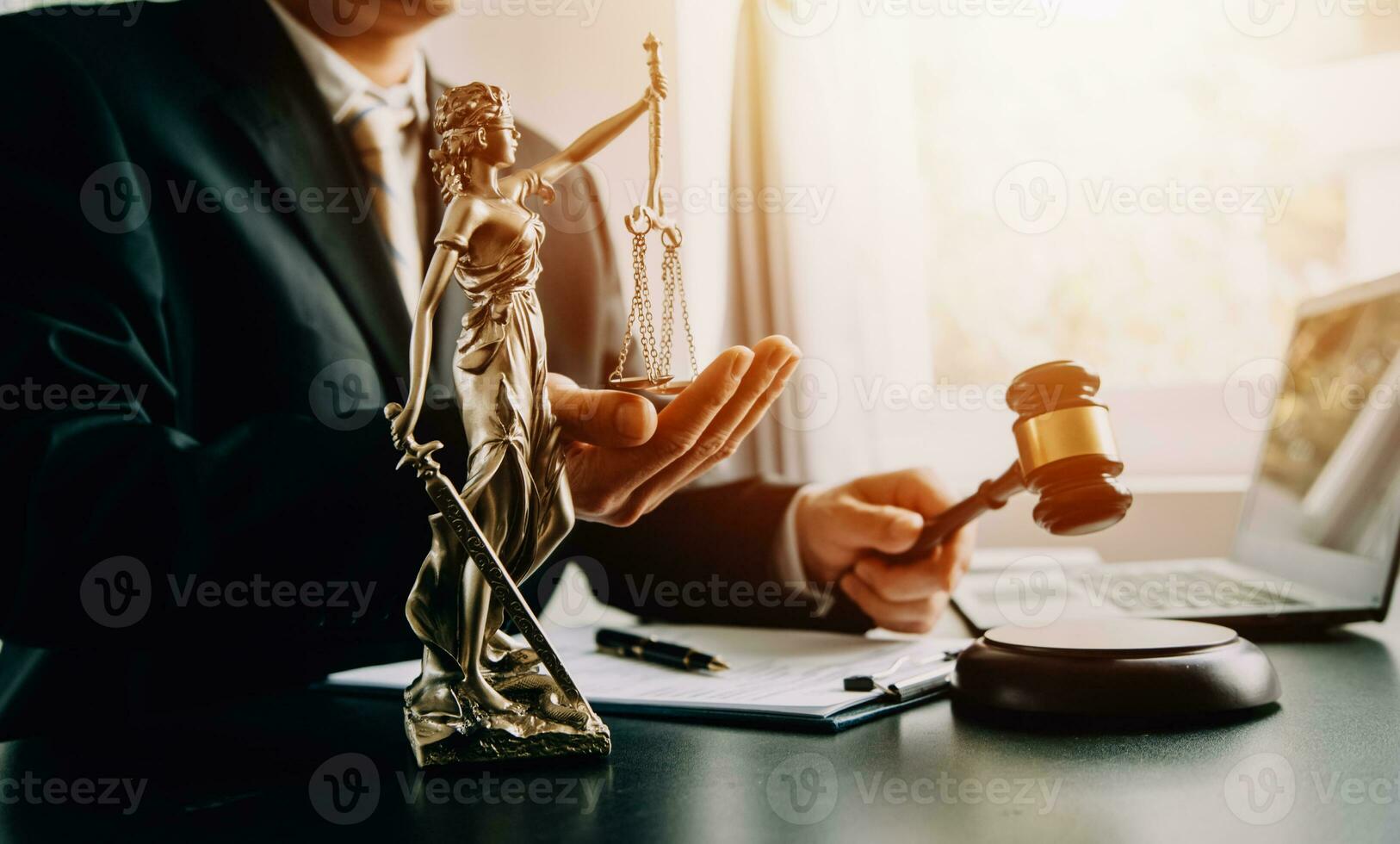 Business and lawyers discussing contract papers with brass scale on desk in office. Law, legal services, advice, justice and law concept picture with film grain effect photo