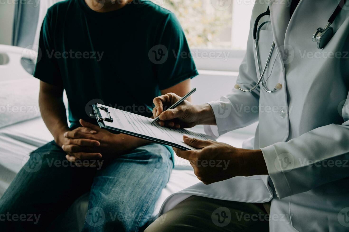 Doctor telling to patient woman the results of her medical tests. Doctor showing medical records to cancer patient in hospital ward. Senior doctor explaint the side effects of the intervention. photo